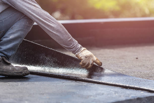 Professional Basement Waterproofing technician working in Vaughnsville, OH